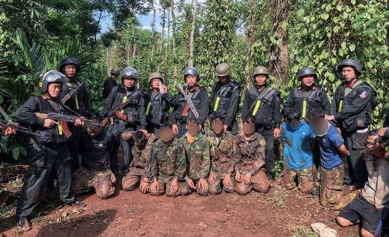 Vietnamese security personnel arrest suspects in the armed attacks in Dak Lak province in this undated photo. Credit: Vietnam Mobile Police High Command