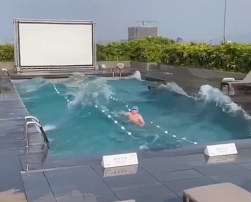 man in pool.JPG