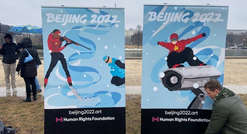 Sports-themed posters created by a human rights group to highlight human rights abuses in China on the eve of the Beijing Winter Games are seen near the U.S. Capitol in Washington, D.C., Feb. 3, 2022. Credit: RFA