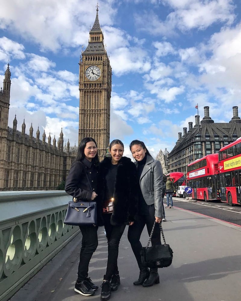 Posing in front of the Houses of Parliament: Neth Vichhuna (right) pictured with her aunts Hun Chantha (center) and Hun Chanthou (left) in London.