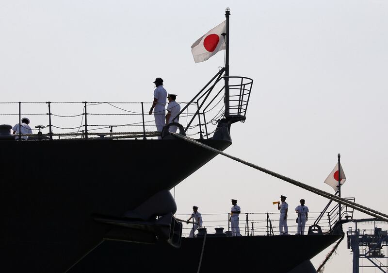 Japan Maritime Self-Defense Force personnel on the destroyers JS Suzutsuki (L) and JS Inazuma (R) after arriving as part of an Indo-Pacific tour at Tanjung Priok Port in Jakarta, Indonesia, in a file photo. Credit: Reuters