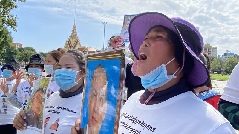 The 'Friday Wives' chant protest slogans outside of the Royal Palace in Phnom Penh, Nov. 20, 2020.