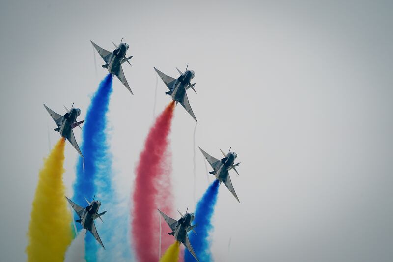 Chinese People’s Liberation Army Air Force Chengdu J-10 jets perform over Don Mueang air base in Bangkok, March 7, 2025.