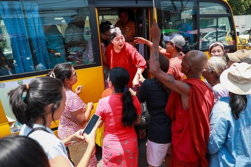 Released prisoners are welcomed by family members and colleagues after they were released from Insein Prison Wednesday, April 17, 2024, in Yangon. (Thein Zaw/AP)