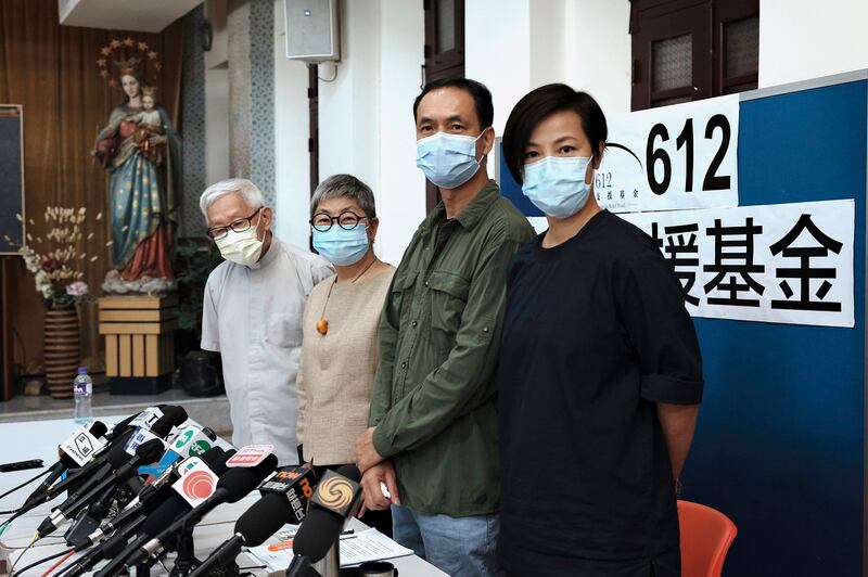 From left, retired archbishop of Hong Kong Cardinal Joseph Zen, barrister Margaret Ng, professor Hui Po-keung and singer Denise Ho attend a press conference to announce the closure of the 612 Humanitarian Relief Fund, in Hong Kong, Aug.18, 2021. Credit: HK01 via AP