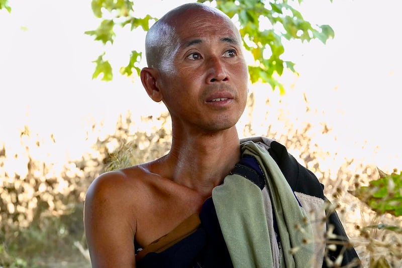 Vietnamese monk Thich Minh Tue is seated in Ubon Ratchathani Province, Thailand, Jan. 1, 2025, one day after he arrived in Thailand from Laos.