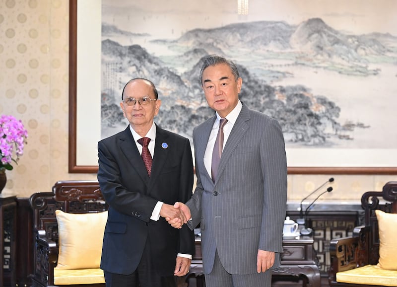 Chinese Foreign Minister Wang Yi, right, meets with former Myanmar President Thein Sein in Beijing, June 29, 2024. (Li Xiang/Xinhua via Getty Images)