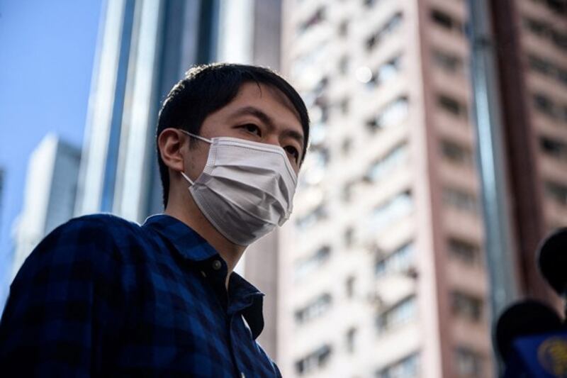 Ted Hui, a former lawmaker from Hong Kong's pro-democracy opposition, speaks to the media as he leaves the Western Police Station in Hong Kong, Nov. 18, 2020. Credit: Anthony Wallace/AFP