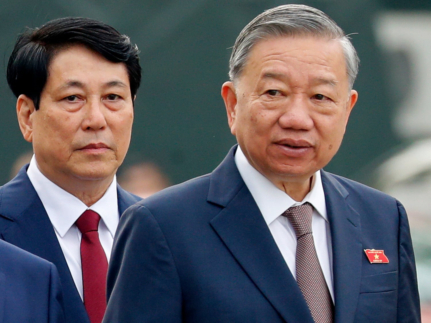 Vietnam's  President Luong Cuong, left, and General Secretary of the Communist Party To Lam, walk to the National Assembly in Hanoi, Vietnam, Oct. 21, 2024.