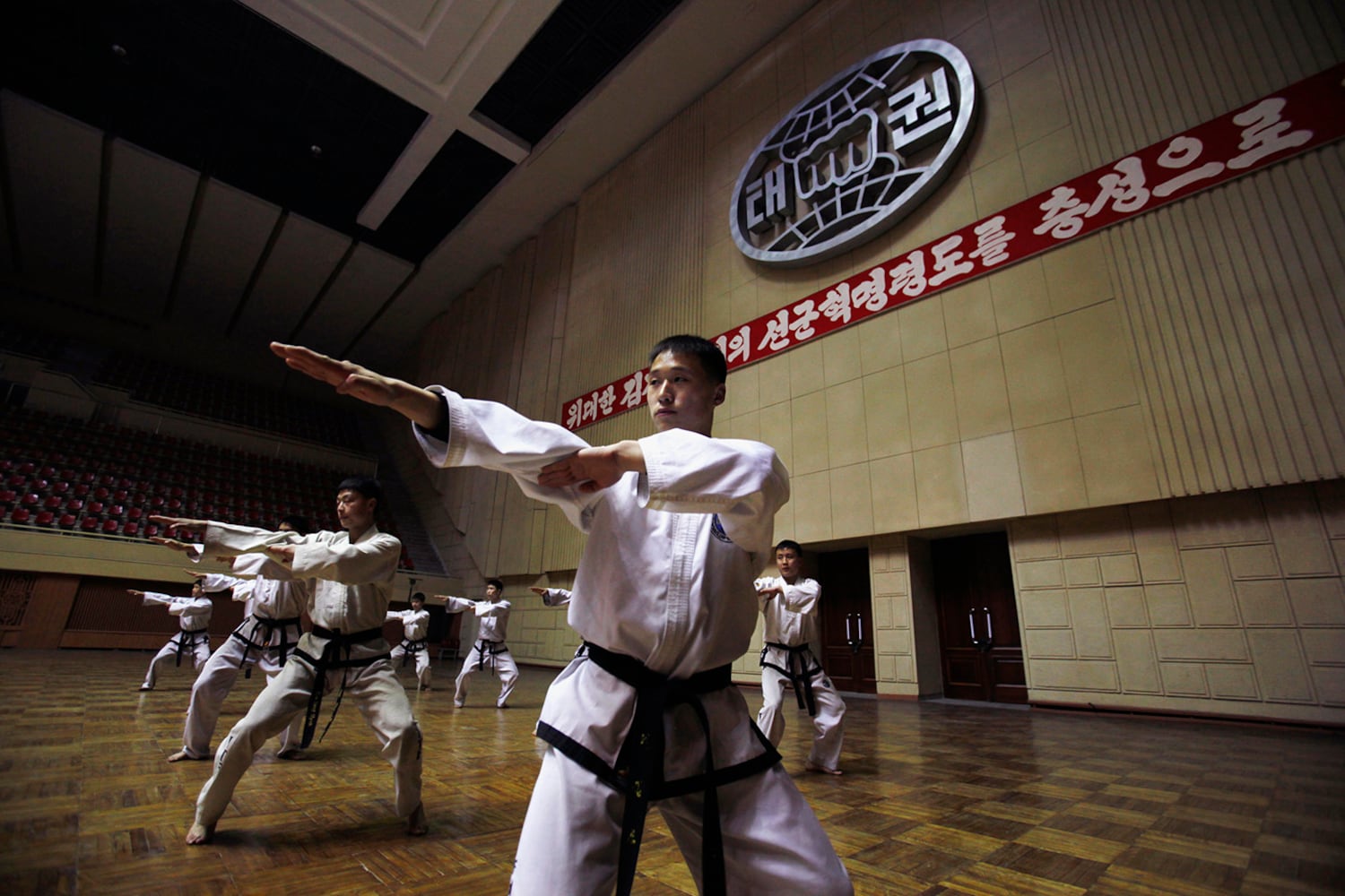 Boys train in a taekwon-do hall in Pyongyang, April 12, 2012.