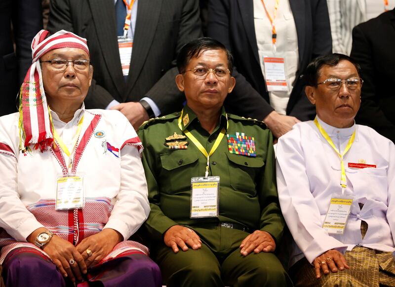 Myanmar's Commander in-Chief Senior General Min Aung Hlaing (C) poses for a photo during the second anniversary of the Nationwide Ceasefire Agreement (NCA) in Naypyidaw, in a file photo. Credit: Reuters