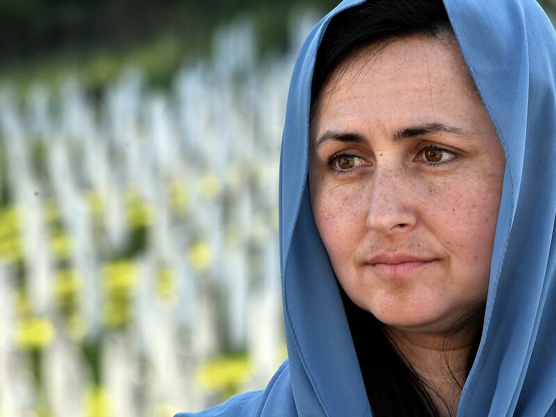 Potocari-Srebrenica Memorial Center spokeswoman Almasa Salihovic, visits the Srebrenica genocide memorial cemetery, in village of Potocari, near Eastern-Bosnian town of Srebrenica, on May 23, 2024.