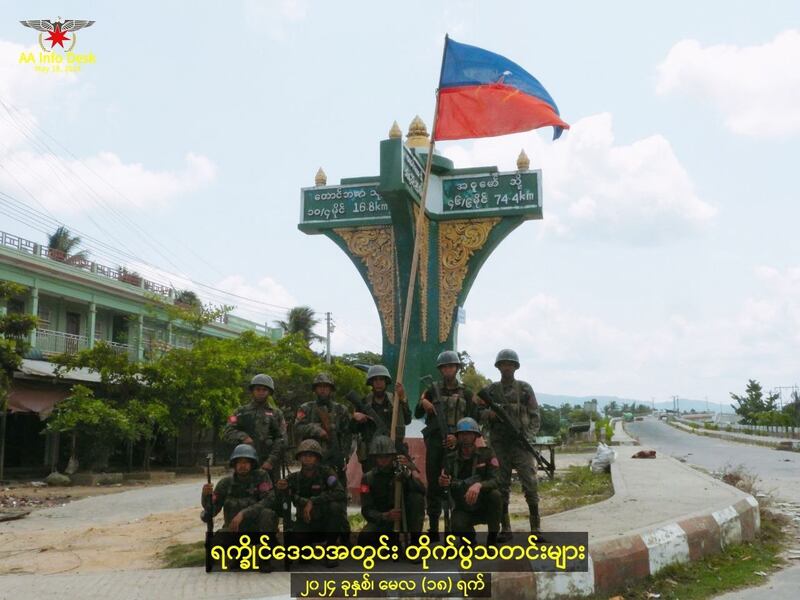 Arakan Army troops pose in Buthidaung, Myanmar, in an image posted to social media May 18, 2024. (AA Info Desk via VKontakte)