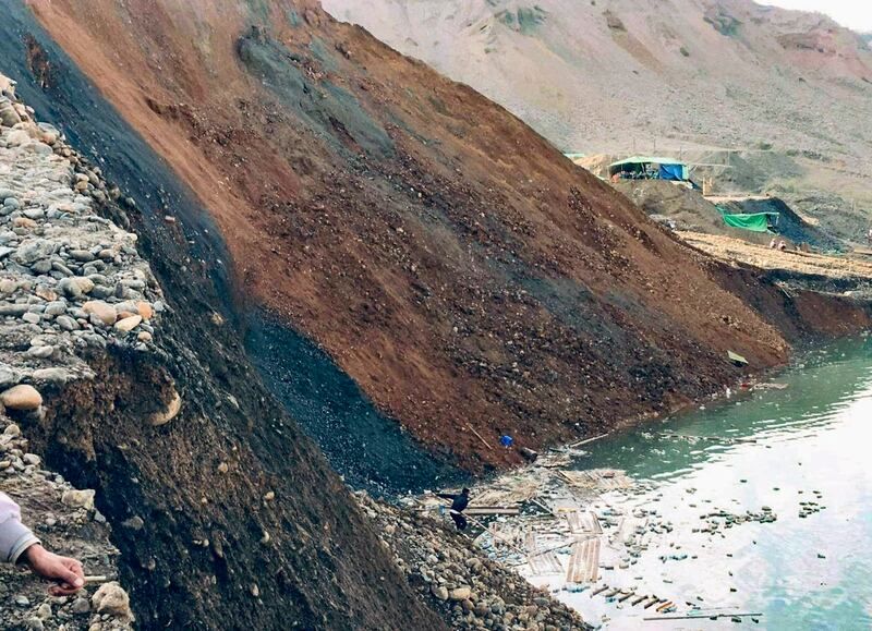 A rescue worker dredges a lake in Thayar Gone village, Dec. 22, 2021. Citizen journalist