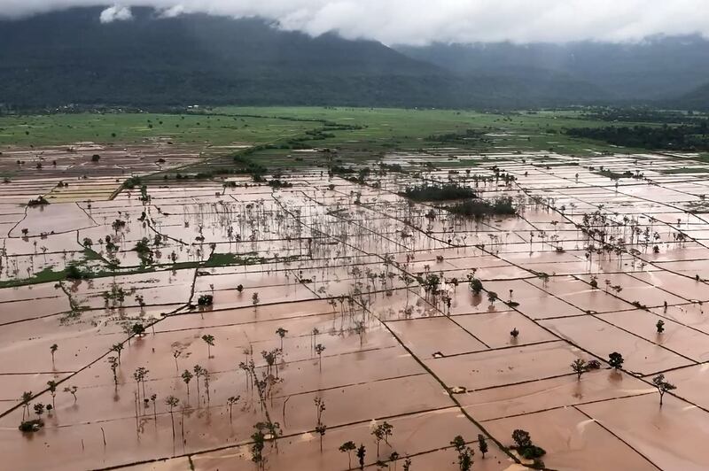 This file photo shows an aerial view of villages flooded after a hydroelectric dam burst in Laos' Attapeu province in July, 2018. 