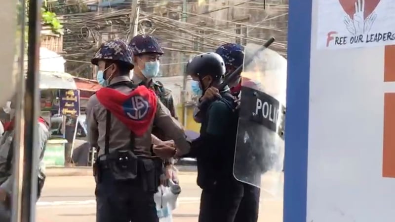 In this image made from video taken on Feb. 27, 2021, Associated Press journalist Thein Zaw is arrested by police in Yangon, Myanmar. Credit: AP Photo