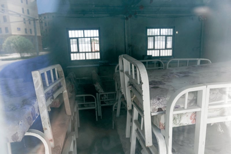 Stacked beds stand in an alleged former detention center known as Yengisheher-2 in Shule county, Kashgar prefecture, northwestern China's Xinjiang region, July 15, 2023. (Pedro Pardo/AFP)