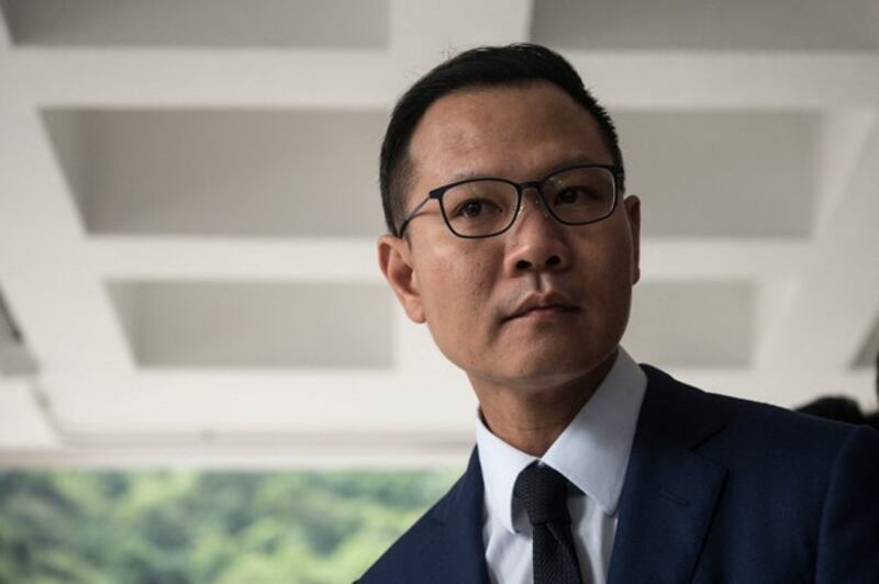 Pro-democracy lawmaker Dennis Kwok answers the questions from the media outside Hong Kong's High Court, Oct. 31, 2019. Credit: Philip Fong/AFP