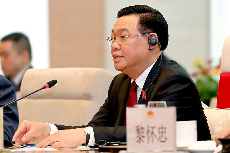 Vuong Dinh Hue, chairman of the National Assembly of Vietnam, speaks to China's President Xi Jinping, not pictured, during a meeting in Hanoi on Dec. 13, 2023. (Minh Hoang/Pool via AFP)