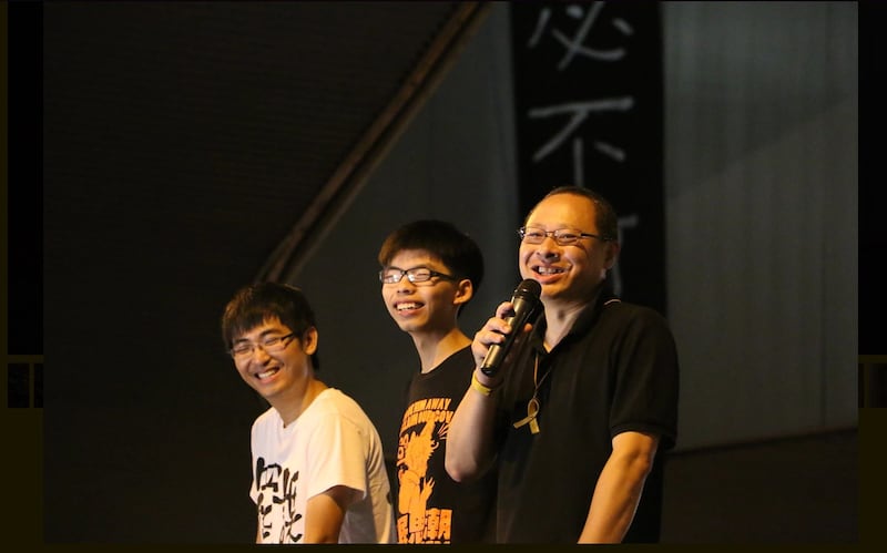 当年香港学联秘书长的周永康与因四十七人初选案被关押多时的黄之锋和戴耀廷是当年雨伞运动的核心人物 (受访者提供)