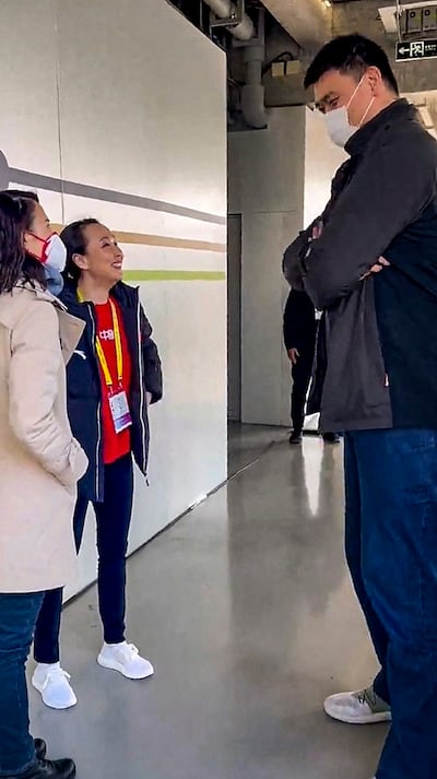 Chinese tennis player Peng Shuai talks with former NBA basketball player Yao Ming at an event in Shanghai, China in this screen grab obtained from a social media video uploaded December 19, 2021. Credit: Twitter @qingqingparis via Reuters