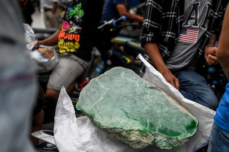 This photo taken on July 6, 2020 shows a piece of jade on sale in a jade market in Hpakant in Kachin state. Credit: AFP