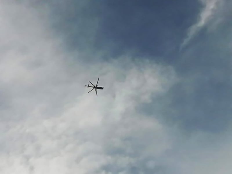 A Myanmar military helicopter flies over Minbya, Sept. 25, 2022. Credit: Hantar