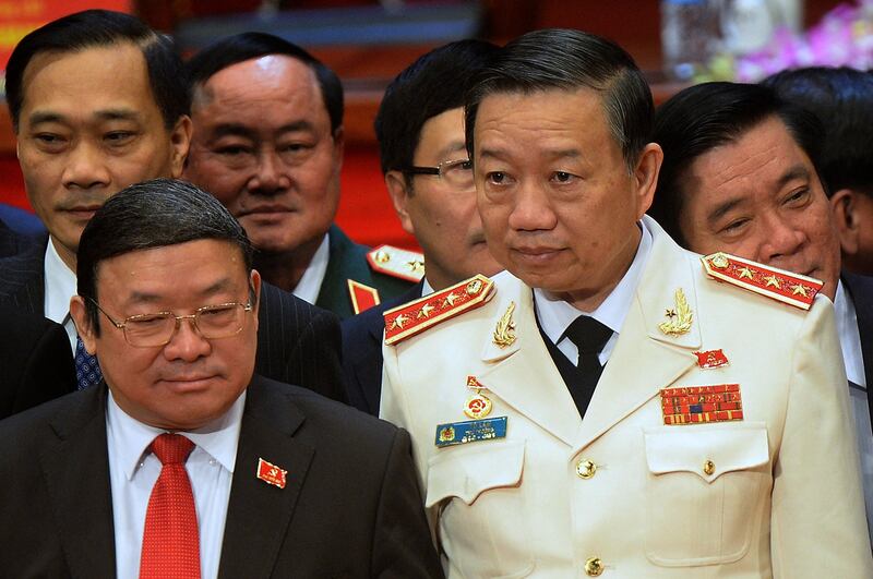 Politburo member Gen. To Lam, right, poses with other members of the Vietnam Communist Party's Central Committee in Hanoi on Jan. 28, 2016. (Hoang Dinh Nam/AFP)