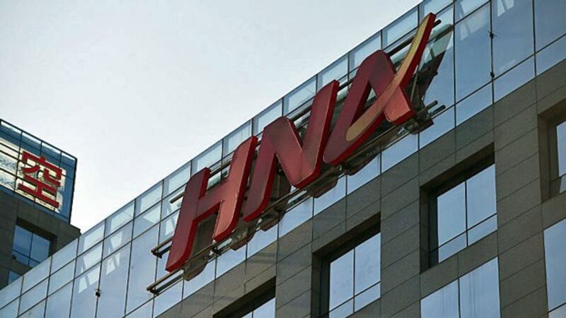 The logo of Chinese conglomerate HNA Group is seen on a building in Beijing, Feb. 18, 2016.