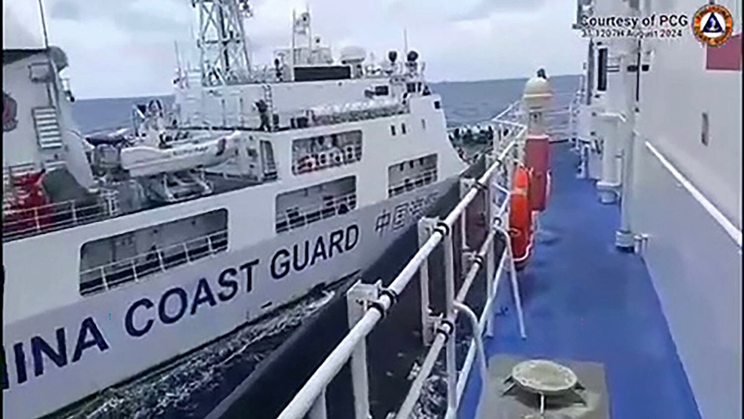 A Chinese coast Guard ship, left, collides with the Philippine Coast Guard ship BRP Teresa Magbanua near the Sabina Shoal in the South China Sea, Aug.  31, 2024.