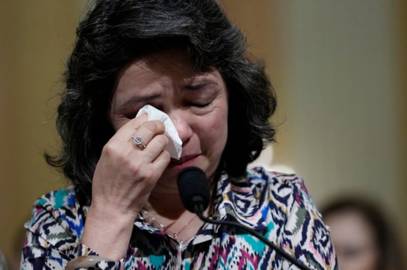 Qelbinur Sidik cries as she testifies at a hearing of the House Select Committee on the Chinese Communist Party on Capitol Hill in Washington, March 23, 2023. (Associated Press)