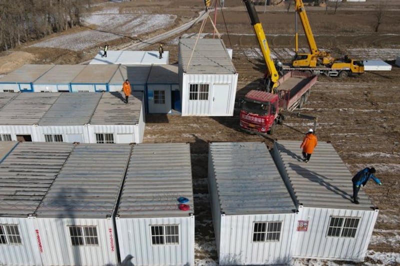 Temporary one-room housing units are set up for earthquake victims in Meipo village in northwestern China's Gansu province, Dec. 21, 2023. (Fan Peishen/Xinhua via AP)