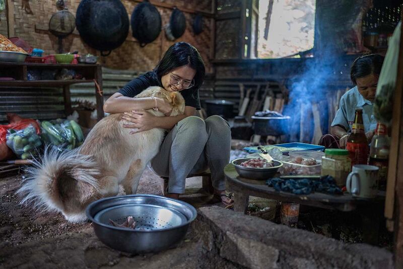 Dr. Hnin with her dog Kia at O-1 hospital in Demoso, Kayah state, Myanmar, Nov. 6, 2024.