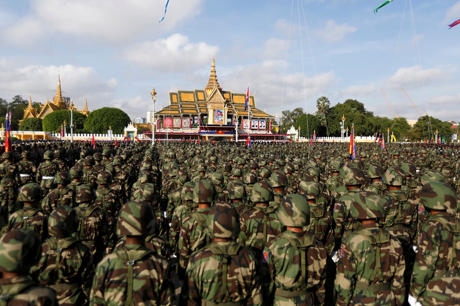 Cambodian soldiers attend celebrations marking the 65th anniversary of the country's independence, in Phnom Penh, Nov. 9, 2018.