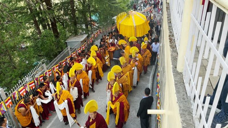 The relics of the Buddha are carried up to the Dalai Lama's residence in Dharamsala, India, April 4, 2024. (Tenzin Woser/RFA)