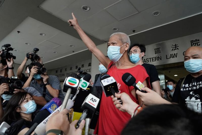 Hong Kong activist Koo Sze-yiu speaks to the media after arriving at a court in Hong Kong, Sept. 30, 2020. (Kin Cheung/AP)