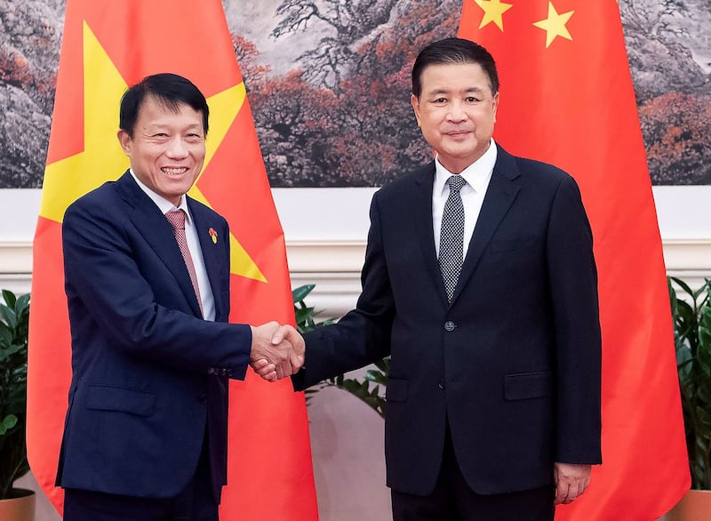 China's Minister of Public Security Wang Xiaohong, right, meets with Luong Tam Quang, Vietnam's minister of public security, in Beijing, Aug. 20, 2024. (Li Tao/Xinhua via Getty Images)