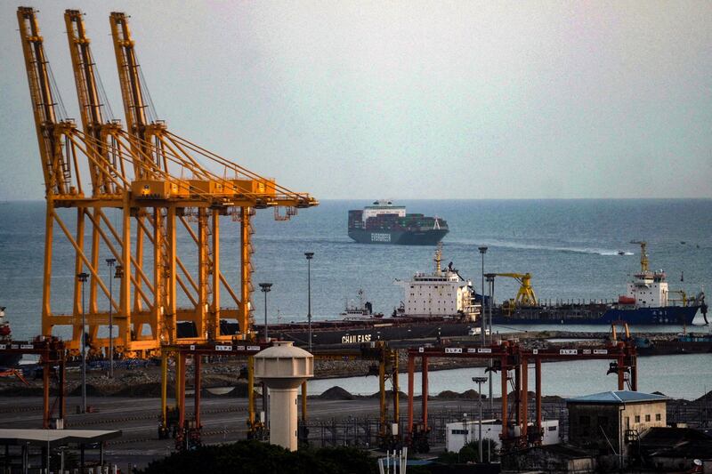 A container ship arrives at a port in Colombo on July 16, 2022. Credit: AFP