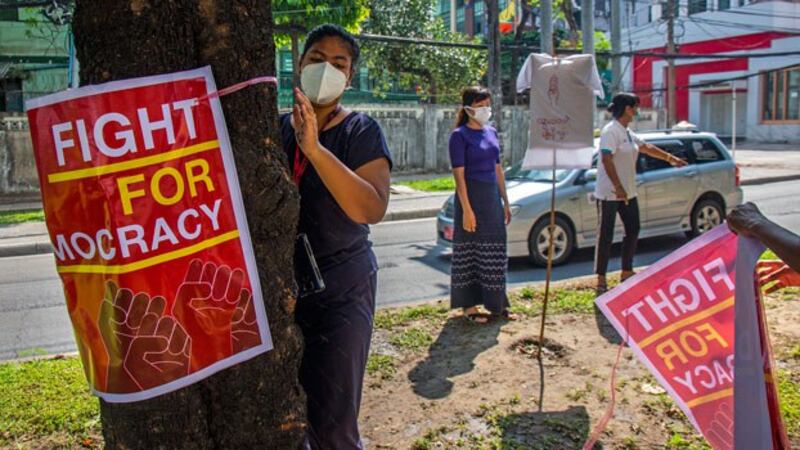 myanmar-anti-coup-protesters-posters-yangon-apr21-2021.jpg