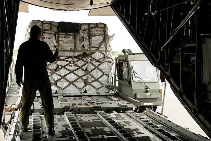 Relief supplies from USAID are loaded into a plane at the Yangon International airport on May 12, 2008.