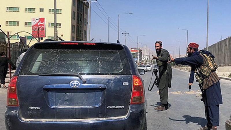 uyghur-taliban-patrol-road-kabul-aug16-2021.gif