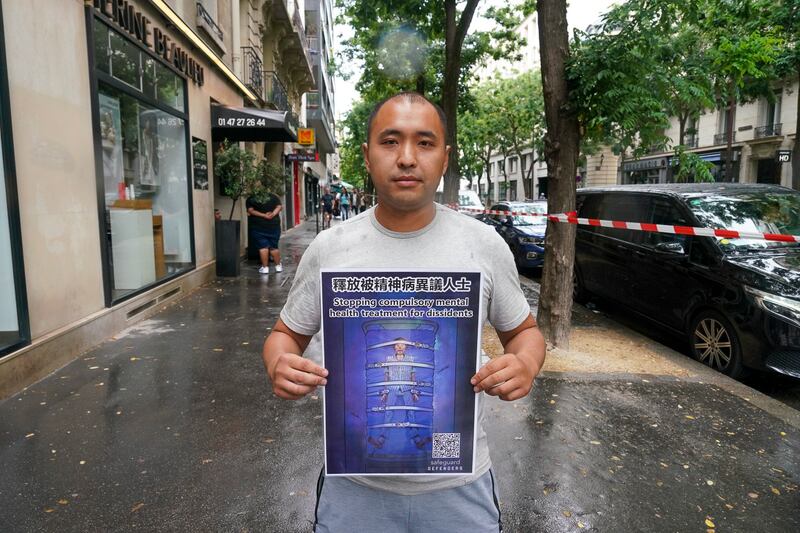 Qian Yun and his family have been persecuted by the local government for a long time, and were forcibly diagnosed as "mentally ill" in 2014, in Paris, July 26, 2024. (RFA)