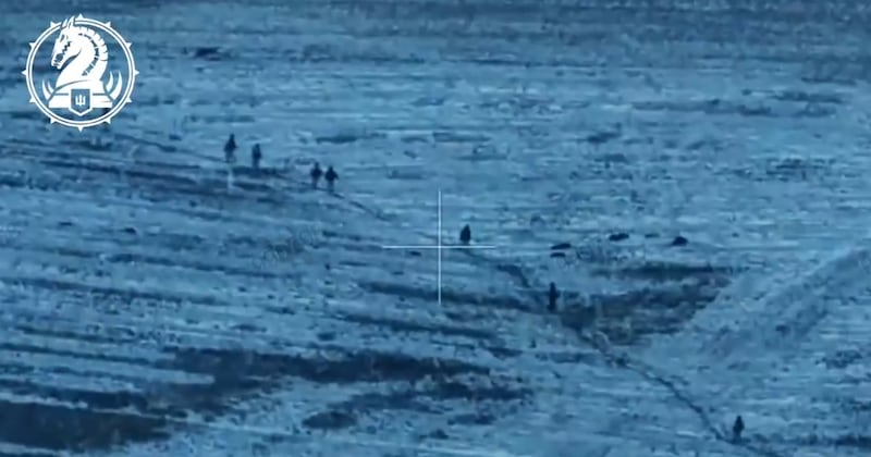 Ukraine’s 47th Separate Mechanized Brigade says this undated image made from video published by the unit shows Russian and North Korean forces in Kursk.