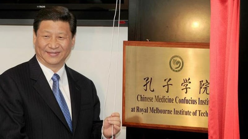 China's President Xi Jinping unveils the plaque at the opening of Australia's first Chinese Medicine Confucius Institute at the RMIT University in Melbourne, June 20, 2010. Xi was China's vice president at the time.