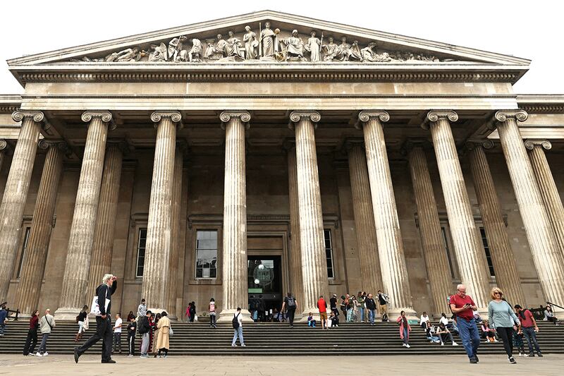 People walk in front of the British Museum in London, England, Sept. 28, 2023.