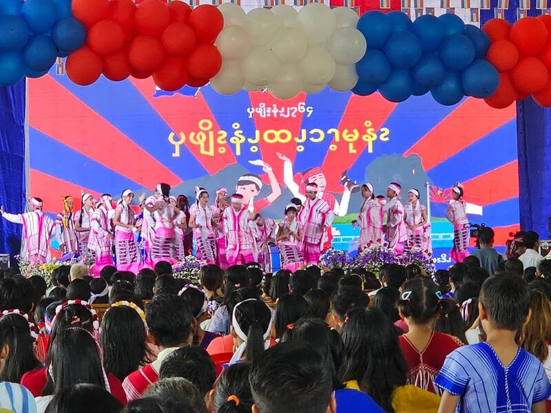 People watch a performance for the Karen New Year’s celebration at the National Races Village in Yangon, Dec. 30, 2024.