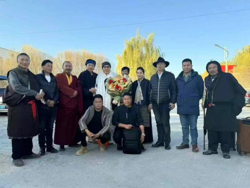 Karma Samdrub, center, reunites with family and friends following his release from prison. November 18, 2024. (Citizen Photo)