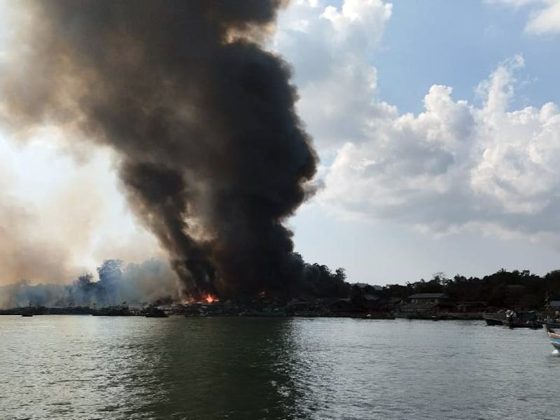 Smoke rises from fires in Kyauk Ni Maw village in Rakhine state, Myanmar, after a Myanmar Air Force bombing raid on Jan. 8, 2025.