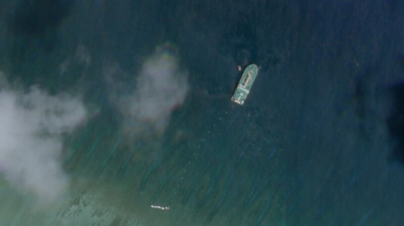 Satellite photo taken June 4 shows the Chinese cable ship Tian Yi Hai Gong just north of Tree Island, a Chinese-occupied feature in the Paracels that hosts a small military outpost and harbor.