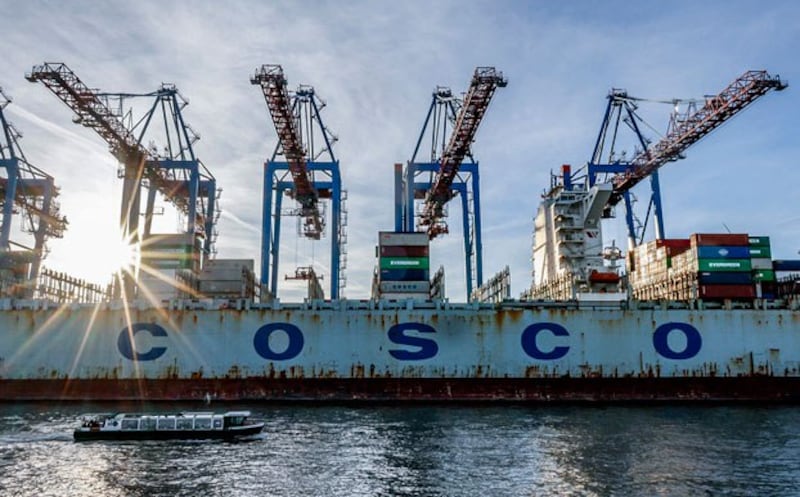 The container ship COSCO Pride owned by China Ocean Shipping (Group) Company is unloaded at the Tollerort Container Terminal in Hamburg, Germany, Oct. 26, 2022. A Chinese firm owns a stake in the terminal. (Axel Heimken/AFP)